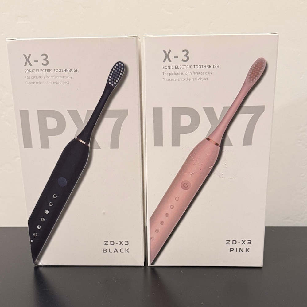 ZD-X3 Sonic Electric Toothbrushes.  Set of 2, one Black and one Pink New